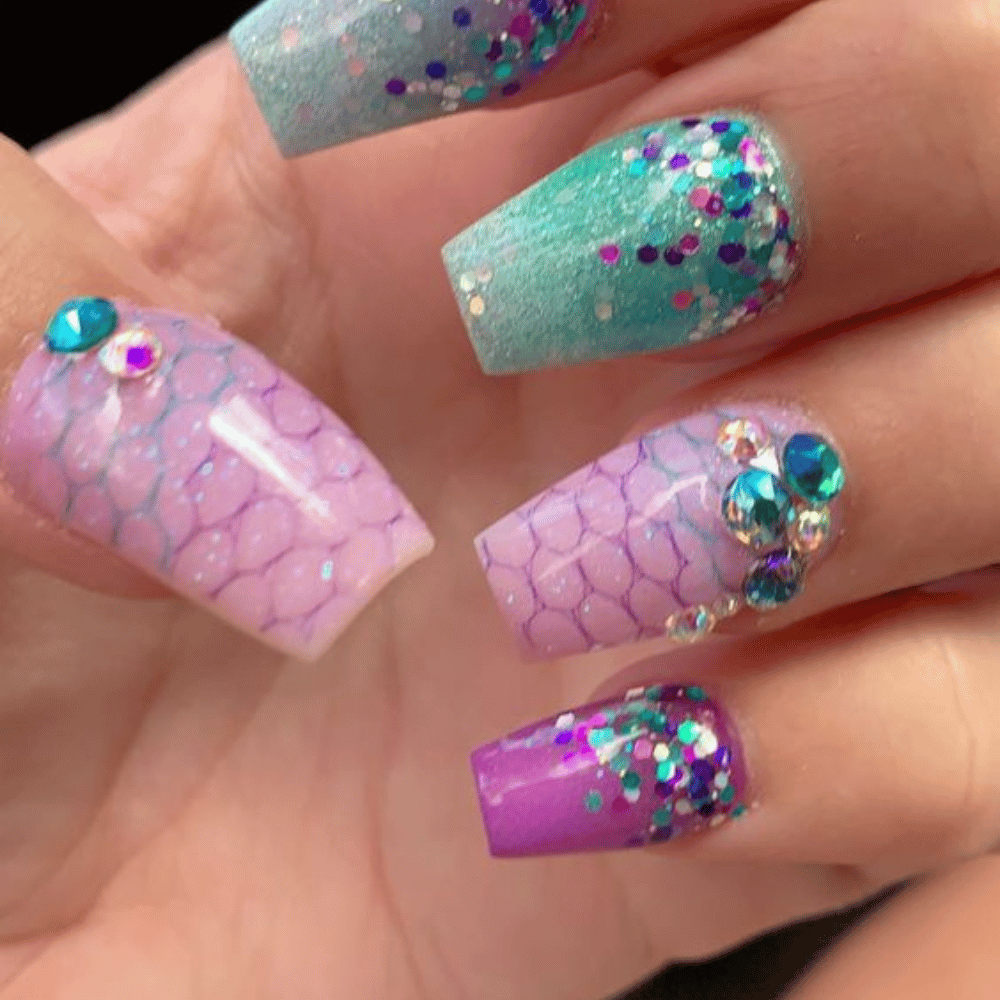 Hand with Pink Nails having Mermaid's Treasure