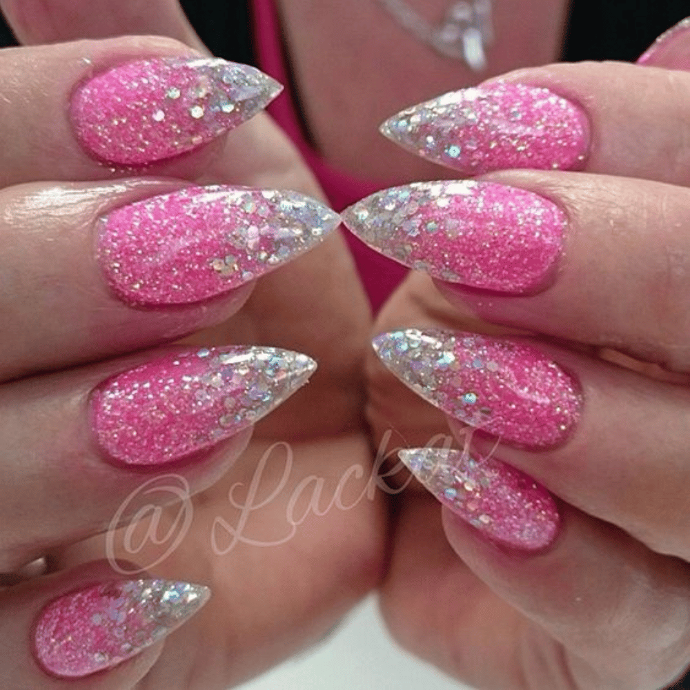 Hand with Pink Nails having Long Pointed Nails