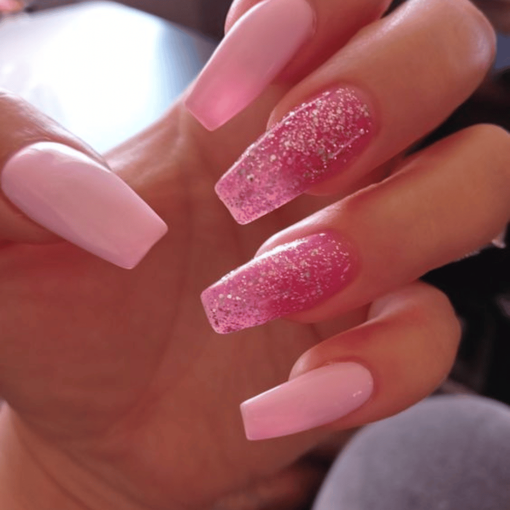 Hand with Pink Nails having Long Coffin Design