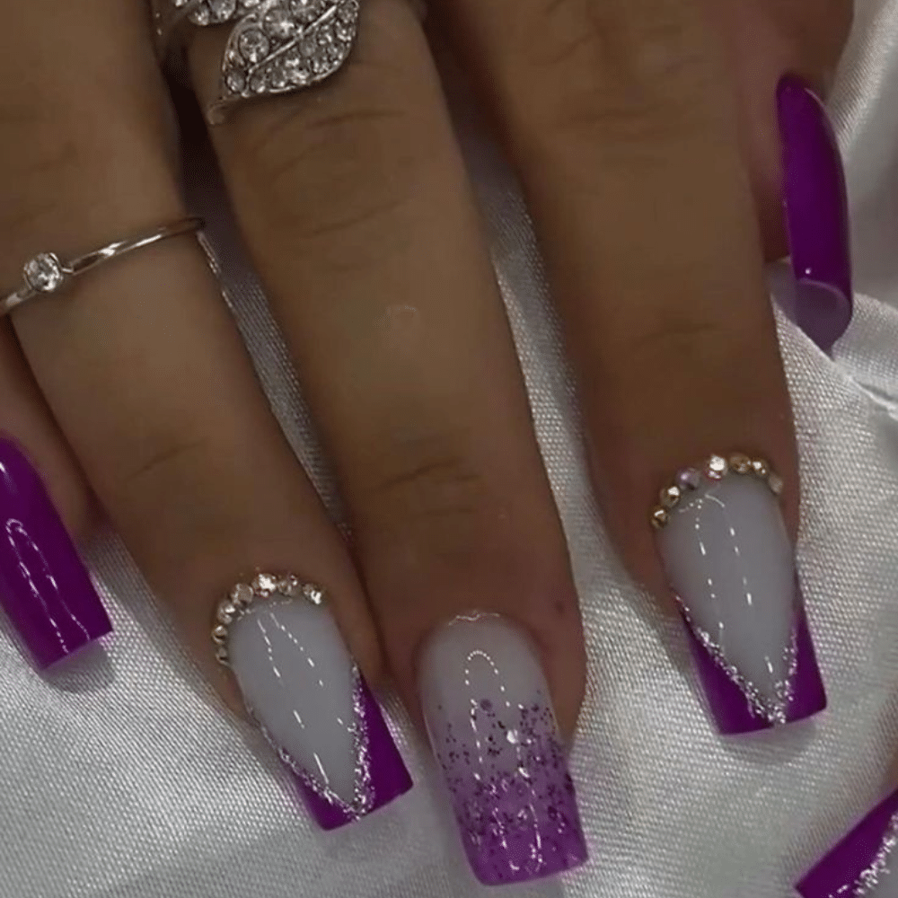 Beautiful purple and white patterned nails