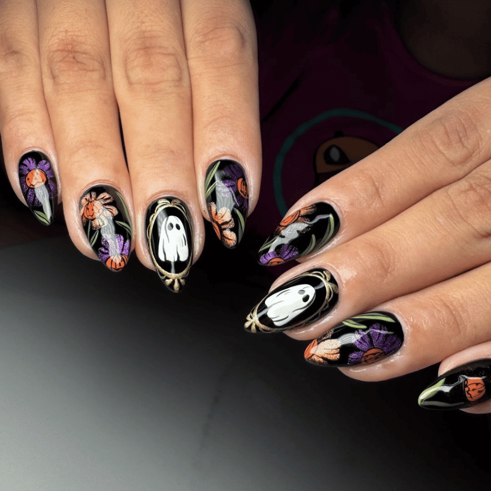 Close-up of Halloween-themed nails with detailed designs like Purple and Green: A Witchy Twist