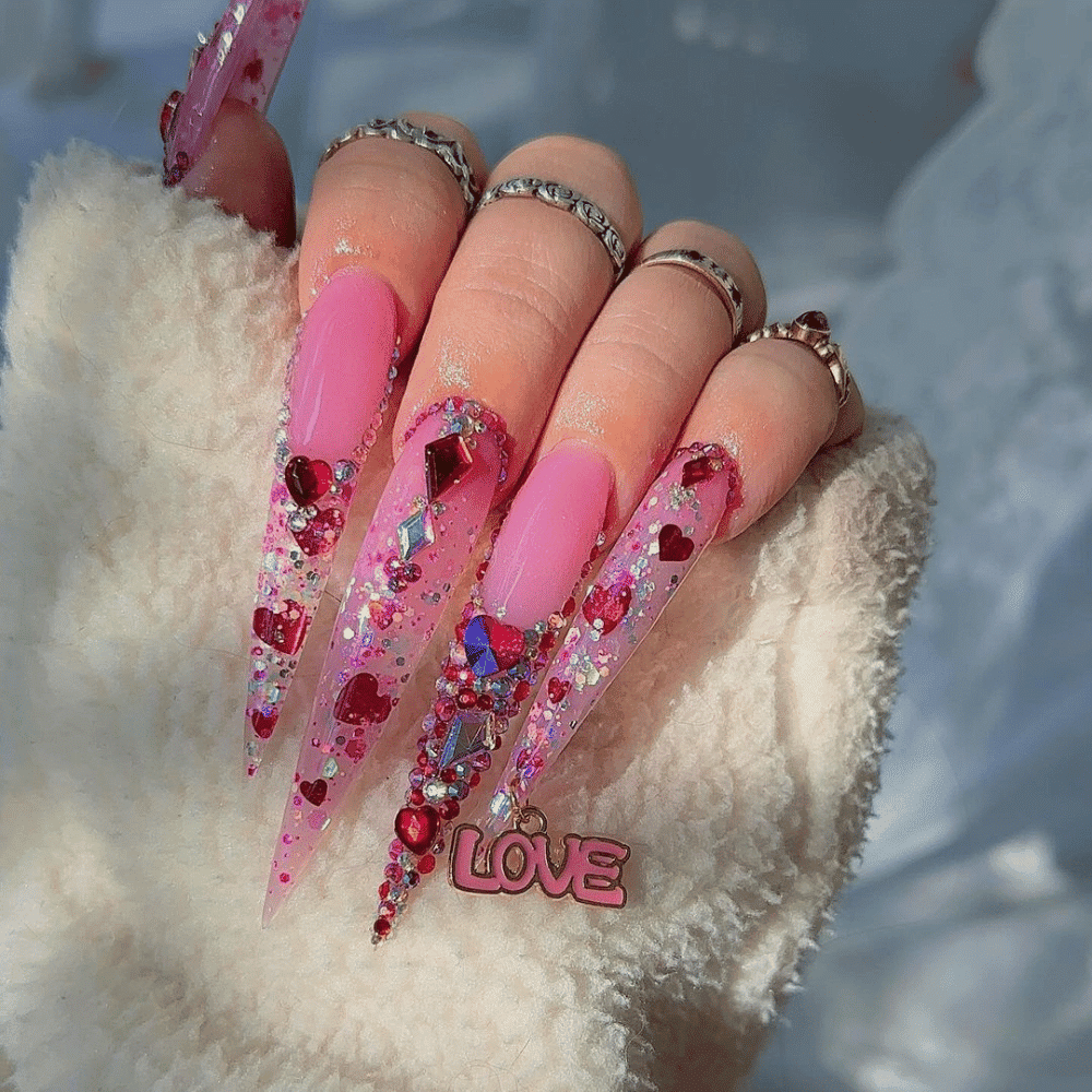 Hand with Pink Nails having Jewel-Encrusted