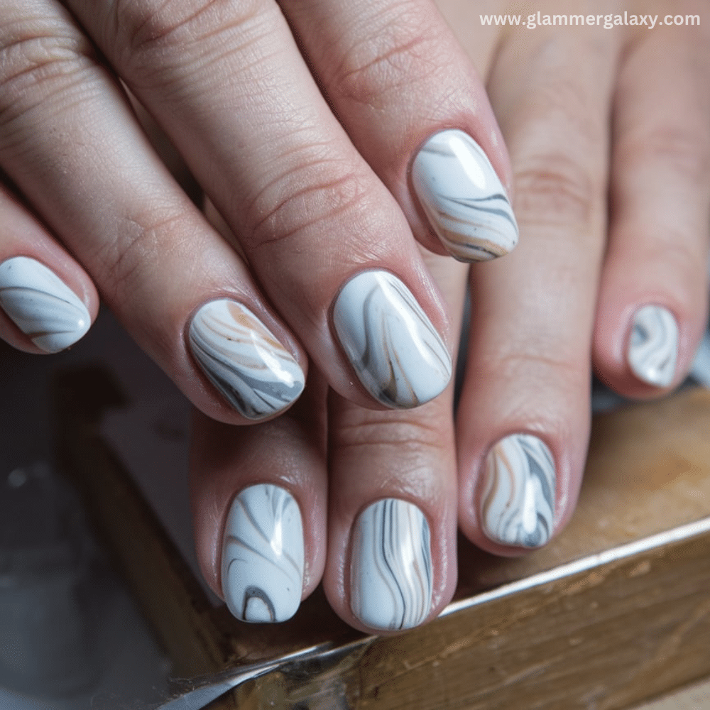 Winter Dip Nail Design featuring Marble Dip Nails