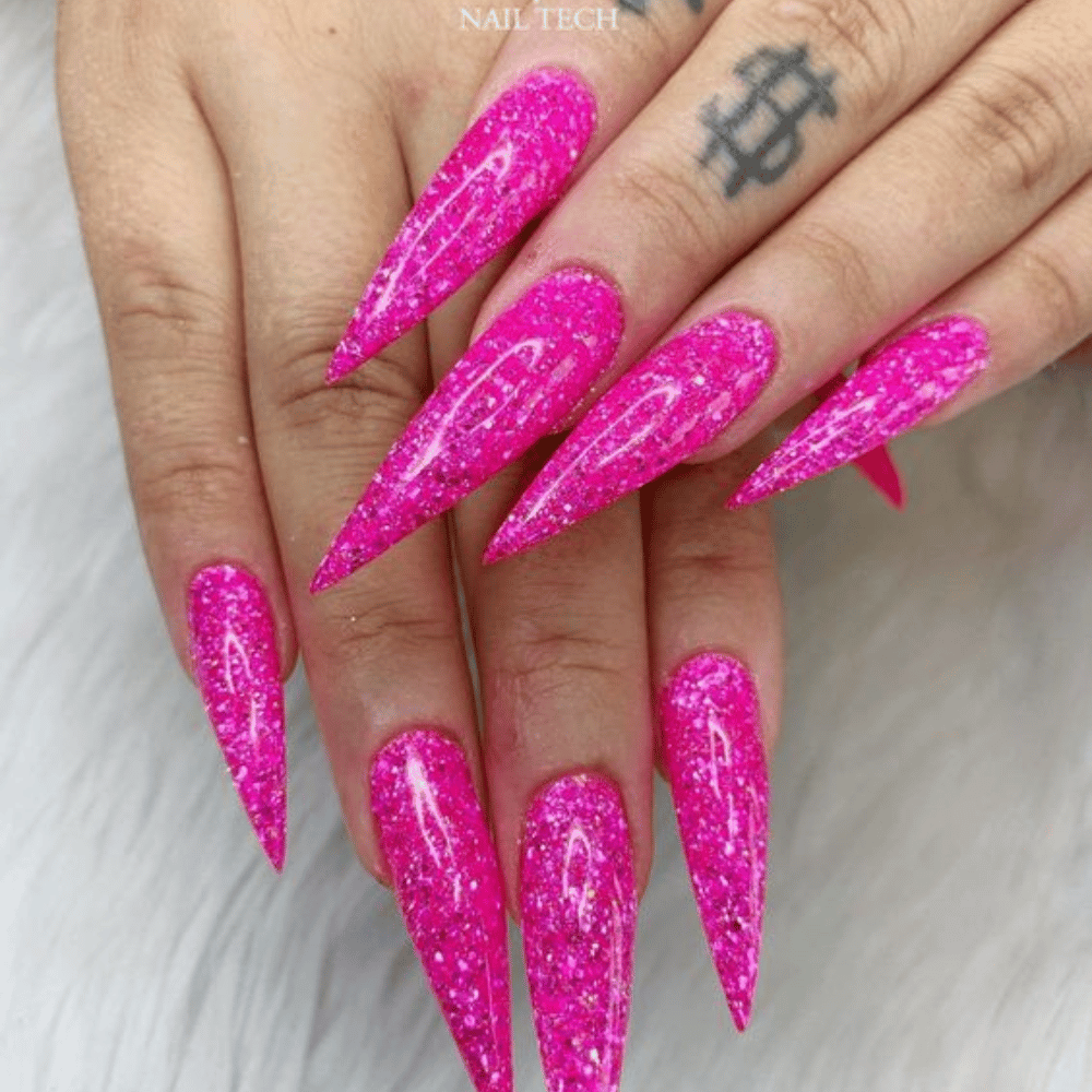 Hand with Pink Nails having Glitter Explosion