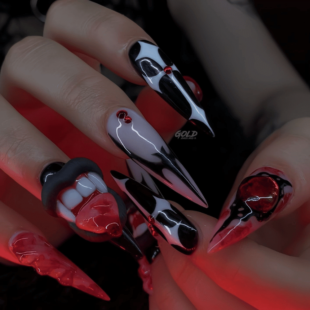 Close-up of Halloween-themed nails with detailed designs like Blood Red and Midnight Black