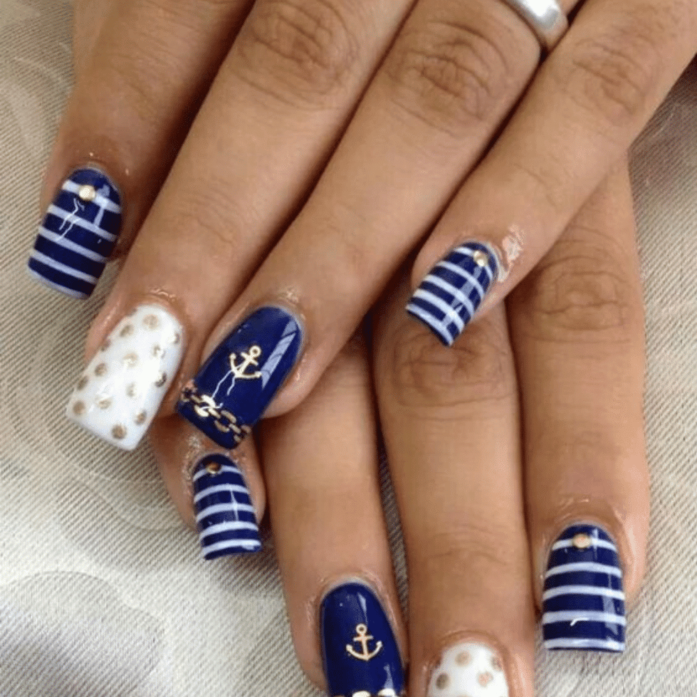 A collection of intricate nautical-themed nail art designs featuring anchors, waves, and seashells in vibrant colors.