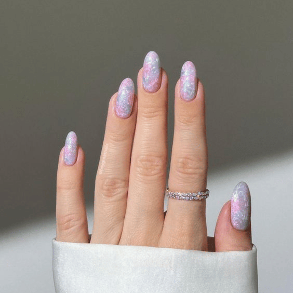 Hand with Pink Nails having Cotton Candy Clouds