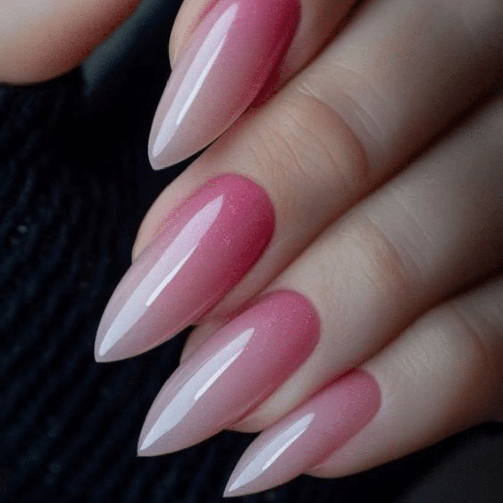 Close-up of a hand with white French tip summer sunset nail