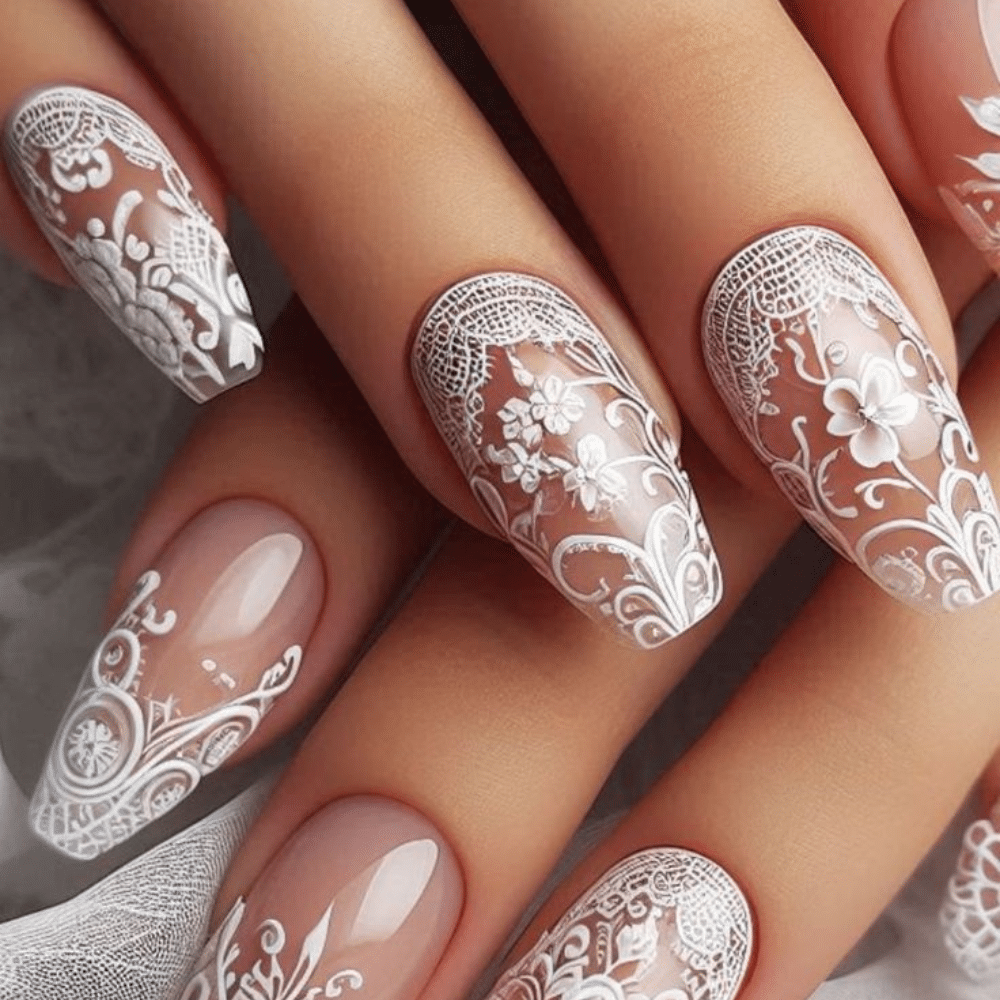 Close-up of a hand with white French tip lace inspired nail