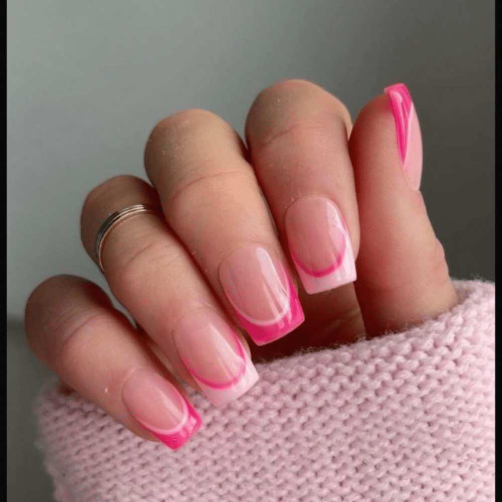 Close-up of a hand with white double french tip nail