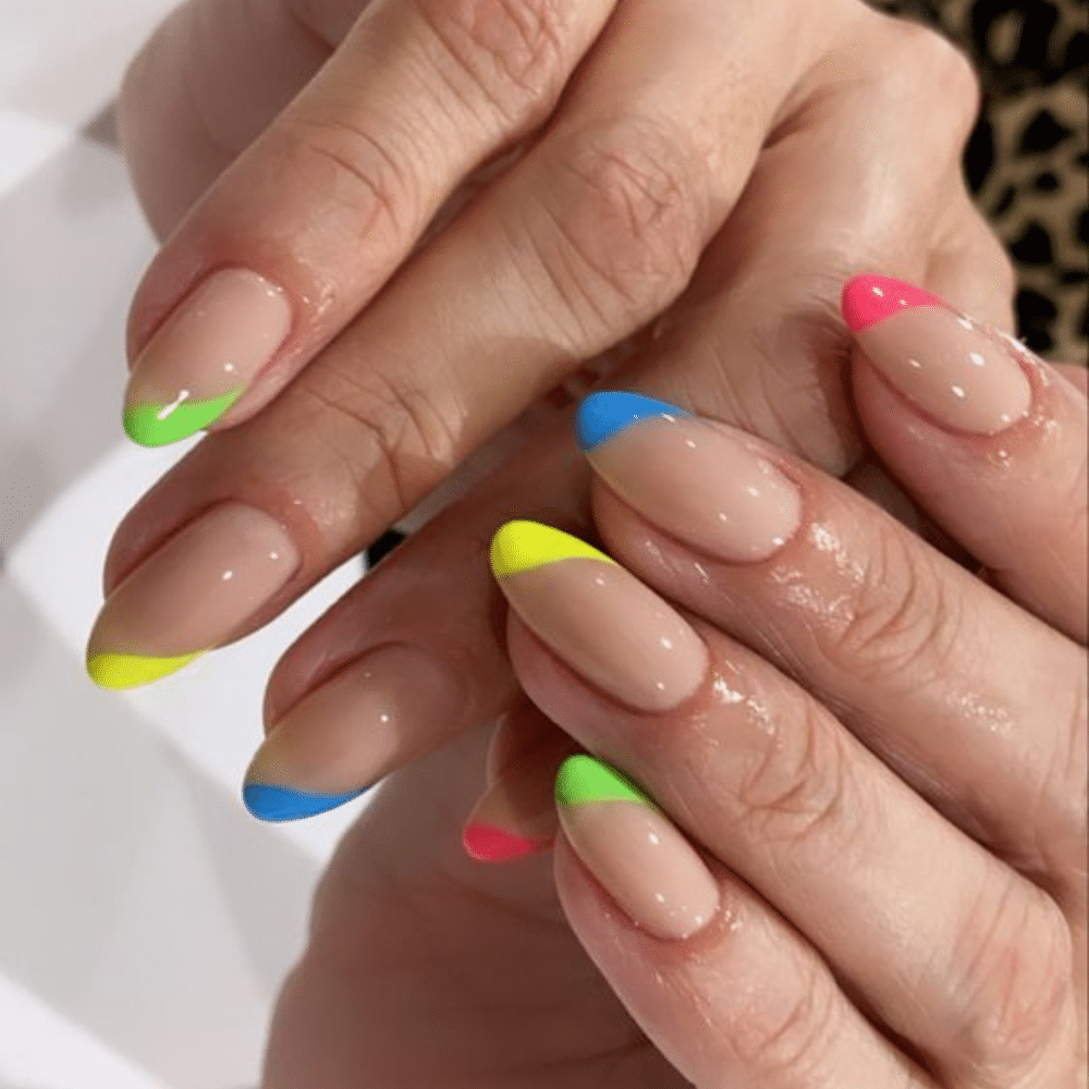 Close-up of a hand with white French LED-Lit Tips nail