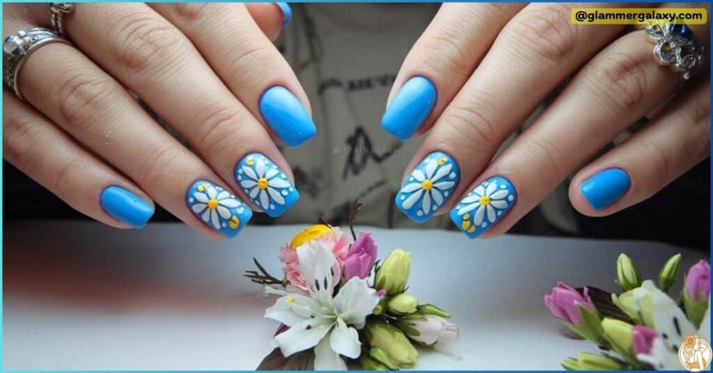 Blue Nails With Flower Designs