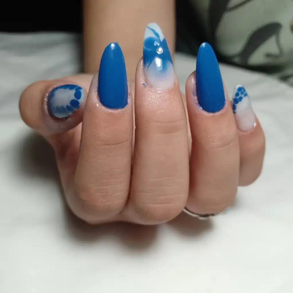 Blue glitter nail art